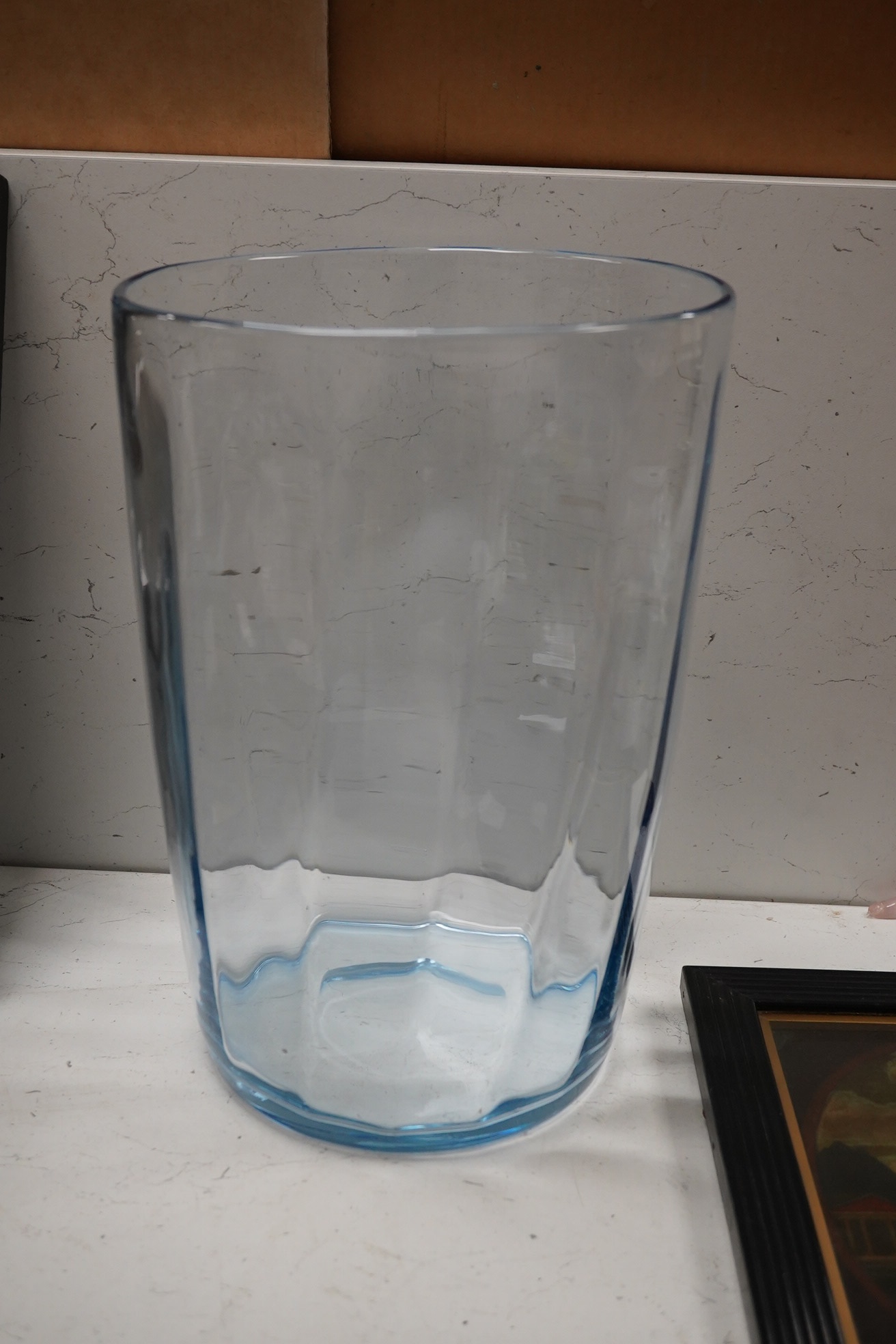 Three coloured glass vases including a Holmegaard green tapering example, largest 31cm high. Condition - good